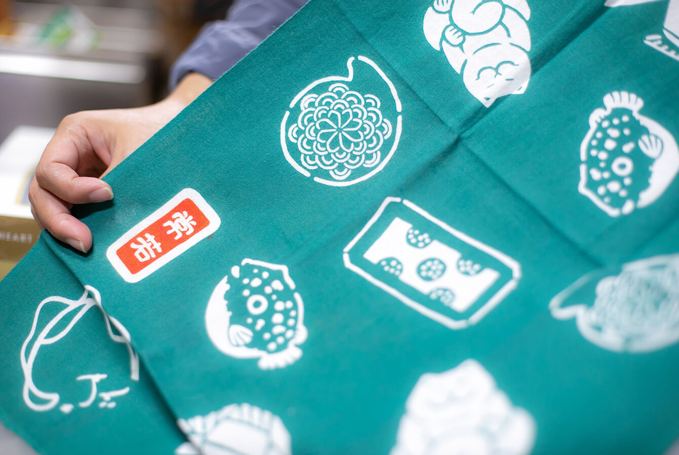 Each member’s design appears on the Tokowaka towel 